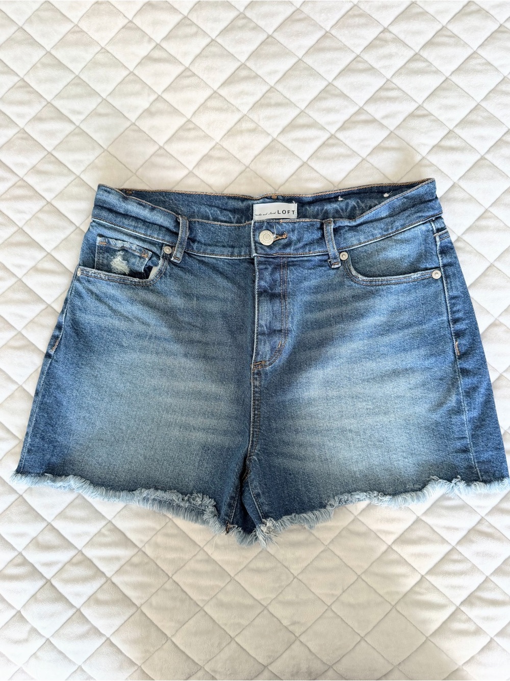 Loft medium wash frayed hem denim shorts size 4